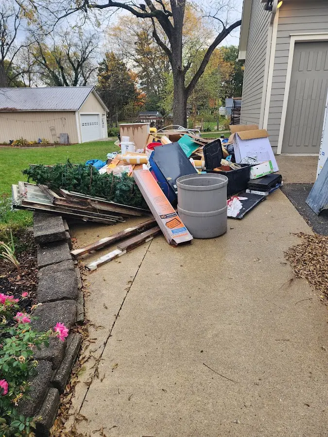 Dumpster being loaded with debris for 30 Yard Dumpster Rental in St. Clairsville